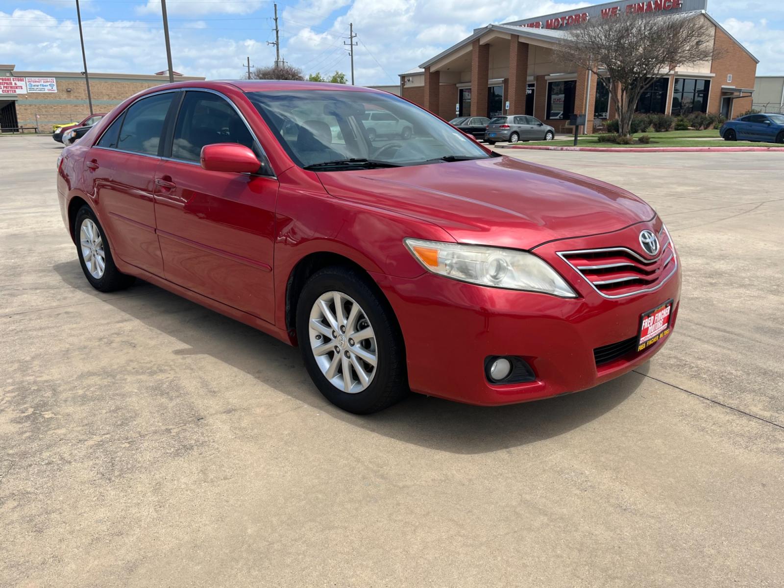 2010 red /TAN Toyota Camry LE V6 6-Spd AT (4T1BK3EK7AU) with an 3.5L V6 DOHC 24V engine, 6-Speed Automatic transmission, located at 14700 Tomball Parkway 249, Houston, TX, 77086, (281) 444-2200, 29.928619, -95.504074 - Photo #0