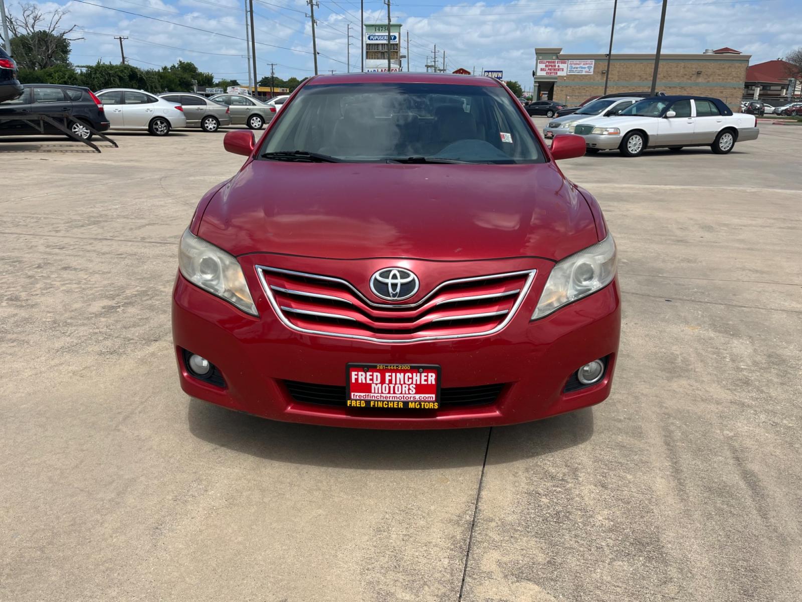 2010 red /TAN Toyota Camry LE V6 6-Spd AT (4T1BK3EK7AU) with an 3.5L V6 DOHC 24V engine, 6-Speed Automatic transmission, located at 14700 Tomball Parkway 249, Houston, TX, 77086, (281) 444-2200, 29.928619, -95.504074 - Photo #1
