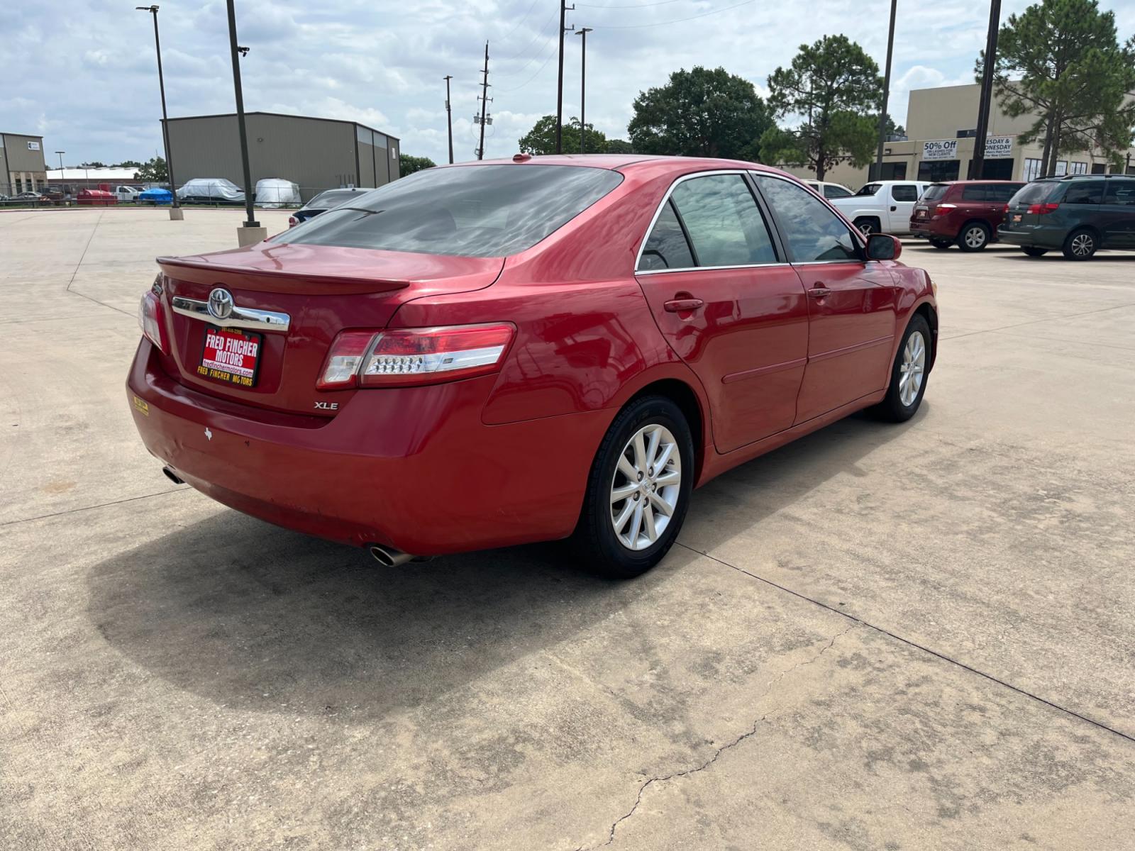 2010 red /TAN Toyota Camry LE V6 6-Spd AT (4T1BK3EK7AU) with an 3.5L V6 DOHC 24V engine, 6-Speed Automatic transmission, located at 14700 Tomball Parkway 249, Houston, TX, 77086, (281) 444-2200, 29.928619, -95.504074 - Photo #6
