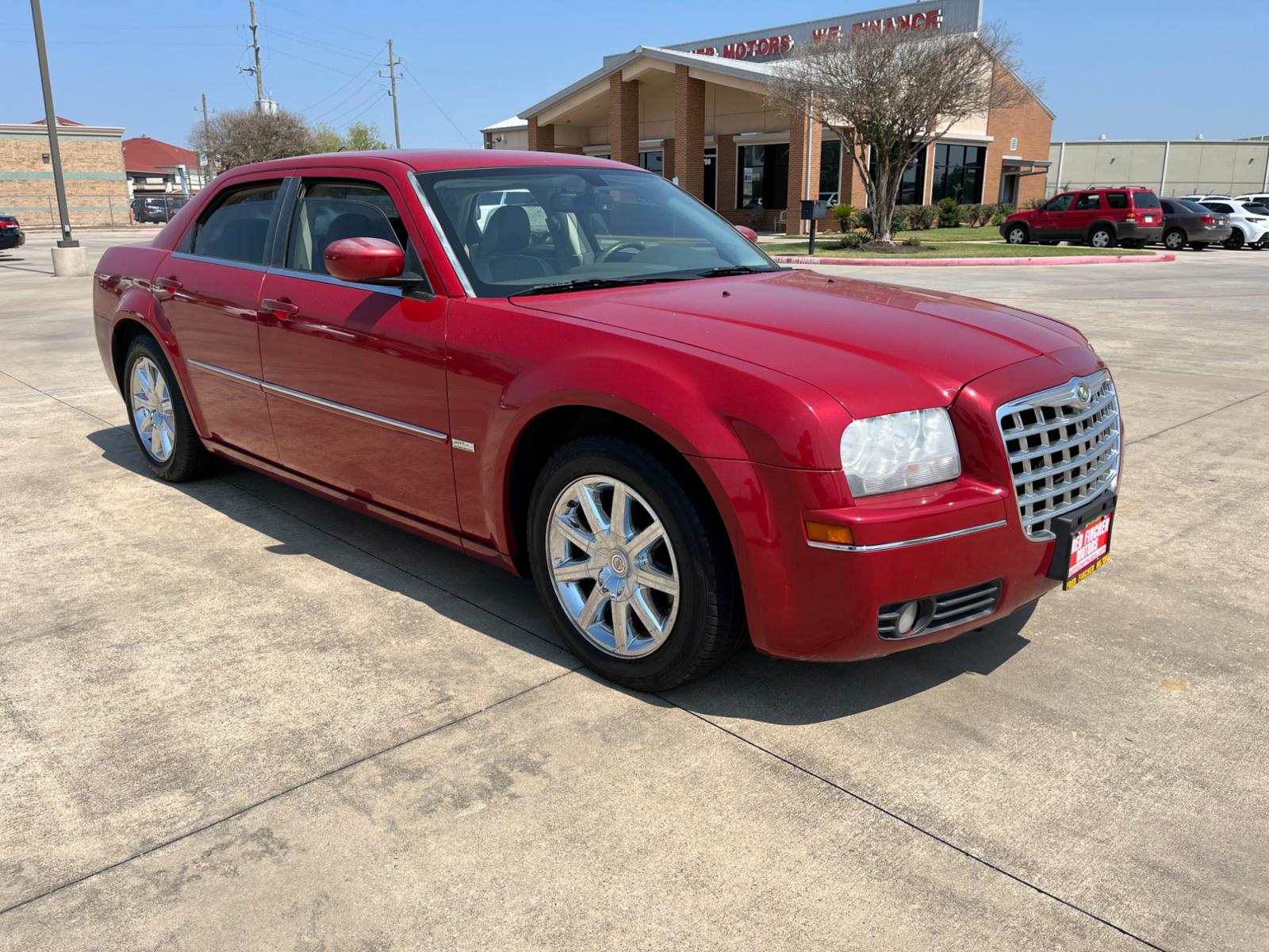 2008 red /TAN Chrysler 300 Touring (2C3LA53GX8H) with an 3.5L V6 DOHC 24V engine, 4-Speed Automatic Overdrive transmission, located at 14700 Tomball Parkway 249, Houston, TX, 77086, (281) 444-2200, 29.928619, -95.504074 - Photo #0