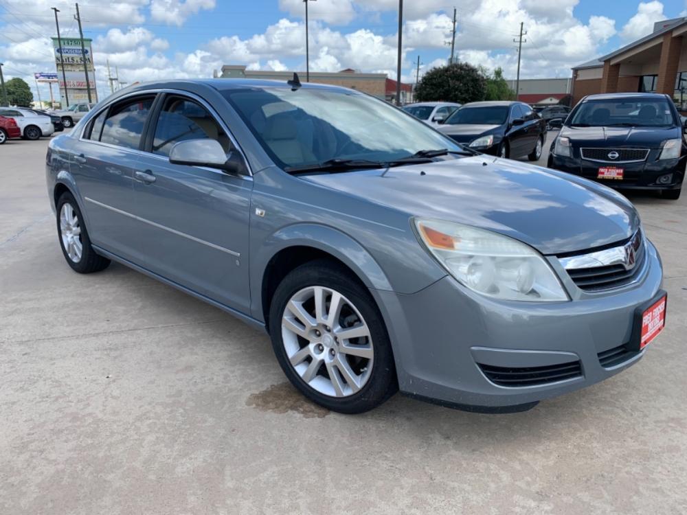 2007 green /gray Saturn Aura XE (1G8ZS57N37F) with an 3.5L V6 12V OHV engine, 4-Speed Automatic Overdrive transmission, located at 14700 Tomball Parkway 249, Houston, TX, 77086, (281) 444-2200, 29.928619, -95.504074 - Photo #0
