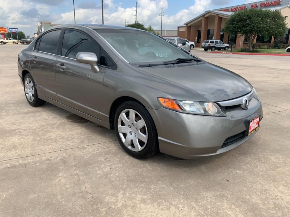 2006 SILVER /TAN Honda Civic LX Sedan AT (1HGFA16516L) with an 1.8L L4 SOHC 16V engine, 5-Speed Automatic Overdrive transmission, located at 14700 Tomball Parkway 249, Houston, TX, 77086, (281) 444-2200, 29.928619, -95.504074 - Photo #0