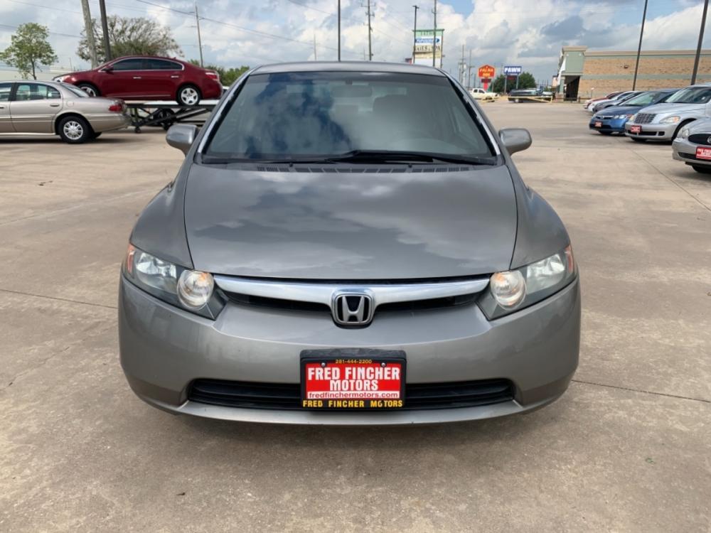 2006 SILVER /TAN Honda Civic LX Sedan AT (1HGFA16516L) with an 1.8L L4 SOHC 16V engine, 5-Speed Automatic Overdrive transmission, located at 14700 Tomball Parkway 249, Houston, TX, 77086, (281) 444-2200, 29.928619, -95.504074 - Photo #1