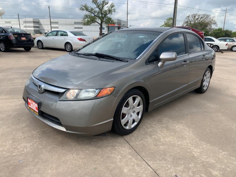 2006 SILVER /TAN Honda Civic LX Sedan AT (1HGFA16516L) with an 1.8L L4 SOHC 16V engine, 5-Speed Automatic Overdrive transmission, located at 14700 Tomball Parkway 249, Houston, TX, 77086, (281) 444-2200, 29.928619, -95.504074 - Photo #2
