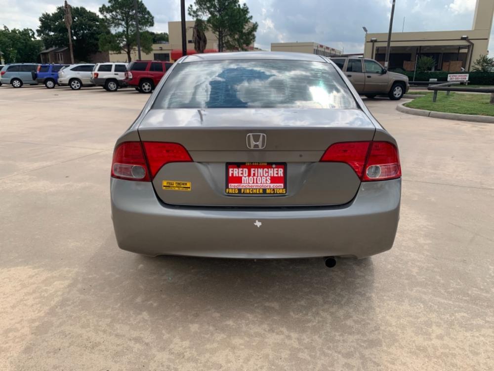 2006 SILVER /TAN Honda Civic LX Sedan AT (1HGFA16516L) with an 1.8L L4 SOHC 16V engine, 5-Speed Automatic Overdrive transmission, located at 14700 Tomball Parkway 249, Houston, TX, 77086, (281) 444-2200, 29.928619, -95.504074 - Photo #5