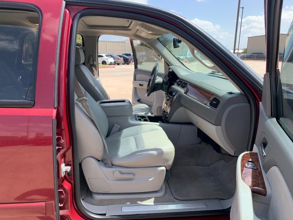 2007 red Chevrolet Tahoe LS 4WD (1GNFK13027J) with an 5.3L V8 OHV 16V FFV engine, 4-Speed Automatic Overdrive transmission, located at 14700 Tomball Parkway 249, Houston, TX, 77086, (281) 444-2200, 29.928619, -95.504074 - Photo #12