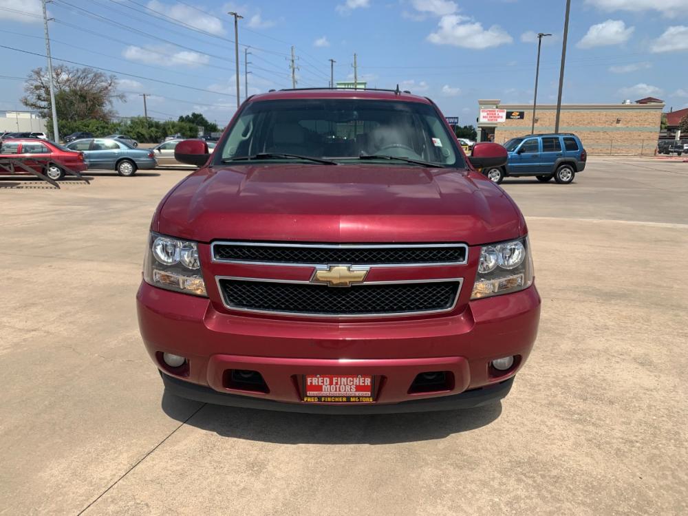 2007 red Chevrolet Tahoe LS 4WD (1GNFK13027J) with an 5.3L V8 OHV 16V FFV engine, 4-Speed Automatic Overdrive transmission, located at 14700 Tomball Parkway 249, Houston, TX, 77086, (281) 444-2200, 29.928619, -95.504074 - Photo #1