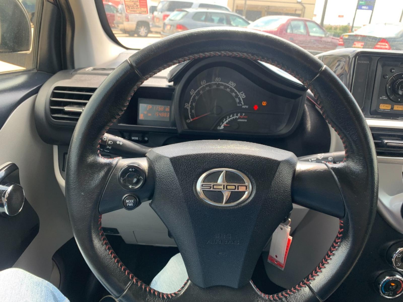2012 MAROON Scion iQ 3-Door Hatchback AT (JTNJJXB08CJ) with an 1.3L L4 engine, Continuously Variable Transmission transmission, located at 14700 Tomball Parkway 249, Houston, TX, 77086, (281) 444-2200, 29.928619, -95.504074 - Photo #15