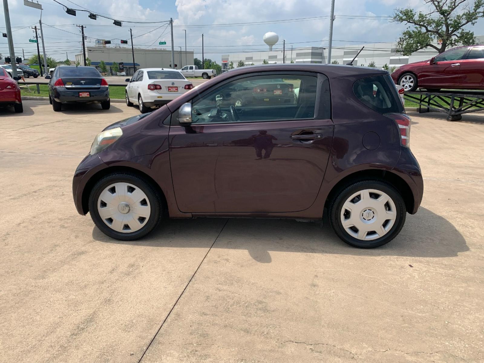 2012 MAROON Scion iQ 3-Door Hatchback AT (JTNJJXB08CJ) with an 1.3L L4 engine, Continuously Variable Transmission transmission, located at 14700 Tomball Parkway 249, Houston, TX, 77086, (281) 444-2200, 29.928619, -95.504074 - Photo #3