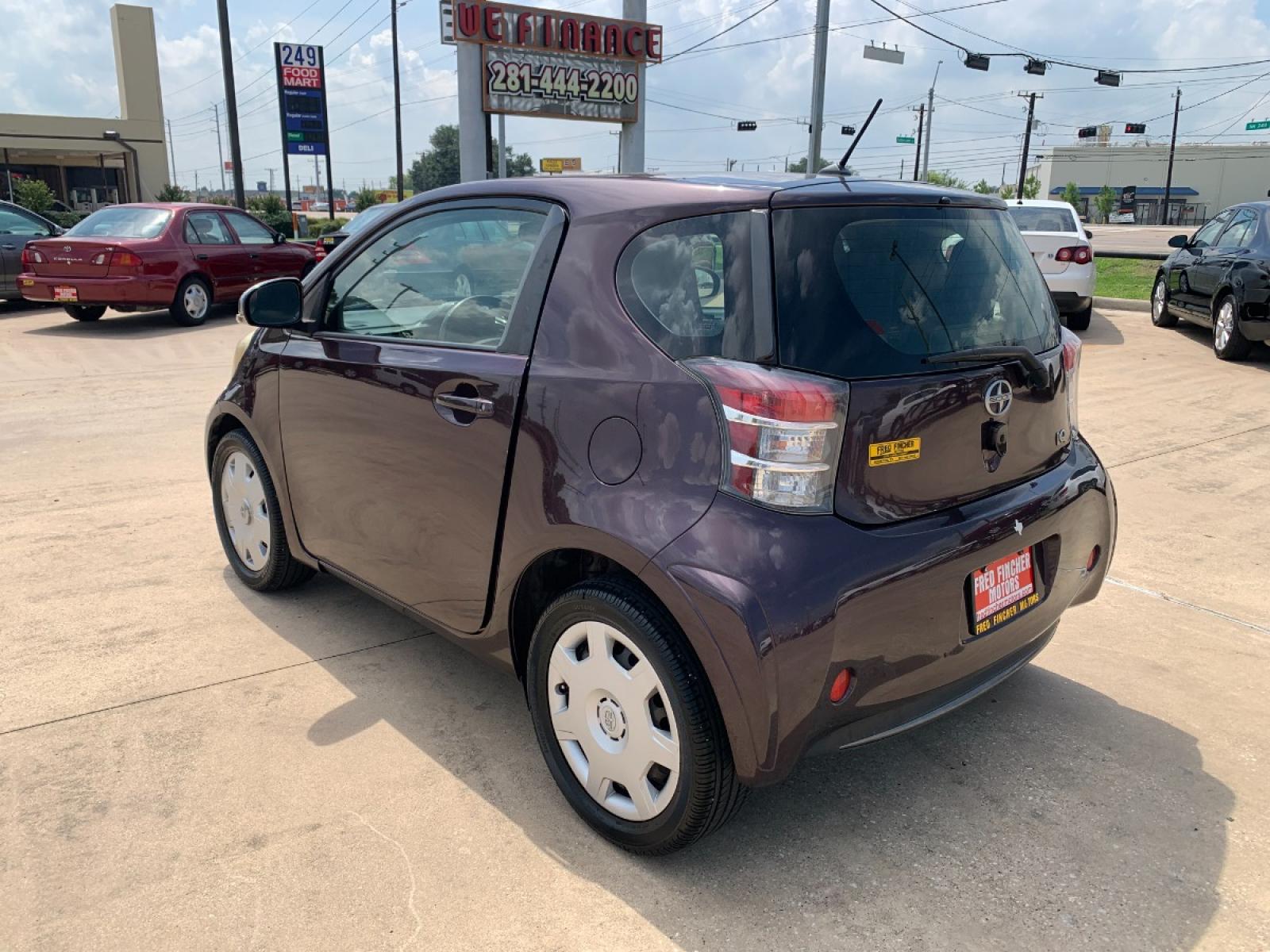 2012 MAROON Scion iQ 3-Door Hatchback AT (JTNJJXB08CJ) with an 1.3L L4 engine, Continuously Variable Transmission transmission, located at 14700 Tomball Parkway 249, Houston, TX, 77086, (281) 444-2200, 29.928619, -95.504074 - Photo #4
