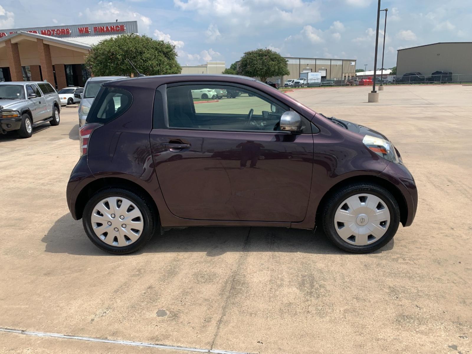 2012 MAROON Scion iQ 3-Door Hatchback AT (JTNJJXB08CJ) with an 1.3L L4 engine, Continuously Variable Transmission transmission, located at 14700 Tomball Parkway 249, Houston, TX, 77086, (281) 444-2200, 29.928619, -95.504074 - Photo #7