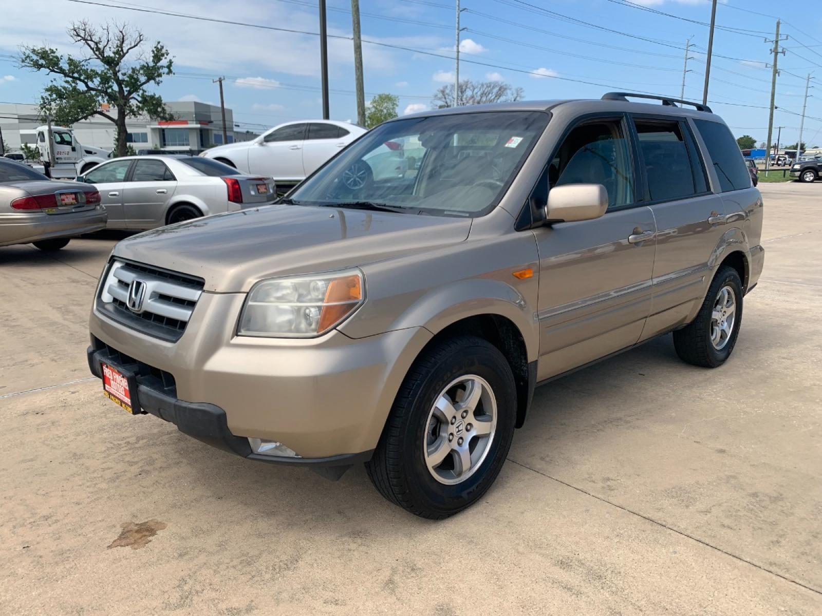 2007 tan Honda Pilot EX-L 4WD AT (2HKYF18547H) with an 3.5L V6 SOHC 24V engine, 5-Speed Automatic Overdrive transmission, located at 14700 Tomball Parkway 249, Houston, TX, 77086, (281) 444-2200, 29.928619, -95.504074 - Photo #2