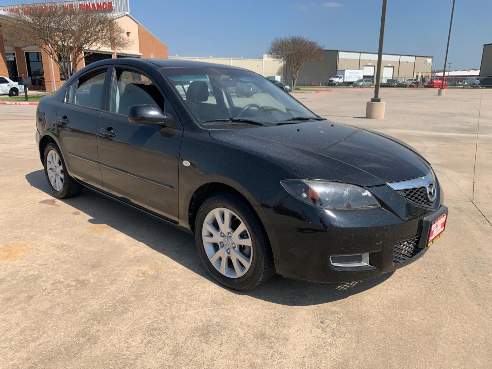 2008 Black /black Mazda MAZDA3 i Sport 4-Door (JM1BK32FX81) with an 2.0L L4 DOHC 16V engine, Automatic transmission, located at 14700 Tomball Parkway 249, Houston, TX, 77086, (281) 444-2200, 29.928619, -95.504074 - Photo #0