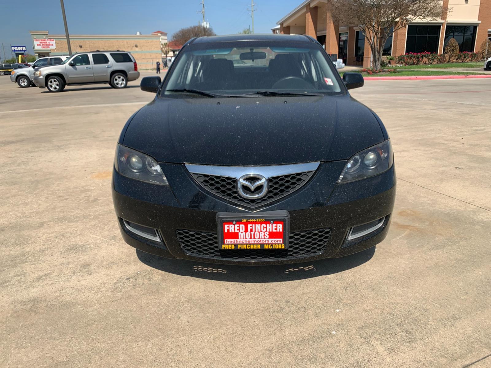 2008 Black /black Mazda MAZDA3 i Sport 4-Door (JM1BK32FX81) with an 2.0L L4 DOHC 16V engine, Automatic transmission, located at 14700 Tomball Parkway 249, Houston, TX, 77086, (281) 444-2200, 29.928619, -95.504074 - Photo #1