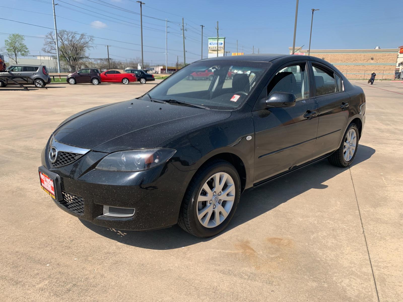 2008 Black /black Mazda MAZDA3 i Sport 4-Door (JM1BK32FX81) with an 2.0L L4 DOHC 16V engine, Automatic transmission, located at 14700 Tomball Parkway 249, Houston, TX, 77086, (281) 444-2200, 29.928619, -95.504074 - Photo #2