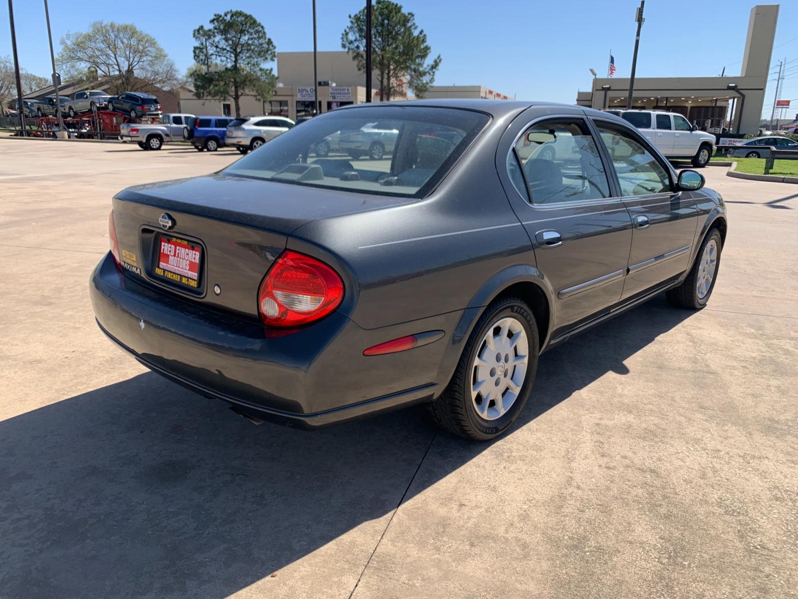 2001 GRAY Nissan Maxima GLE (JN1CA31D41T) with an 3.0L V6 DOHC 24V engine, 4-Speed Automatic Overdrive transmission, located at 14700 Tomball Parkway 249, Houston, TX, 77086, (281) 444-2200, 29.928619, -95.504074 - Photo #6