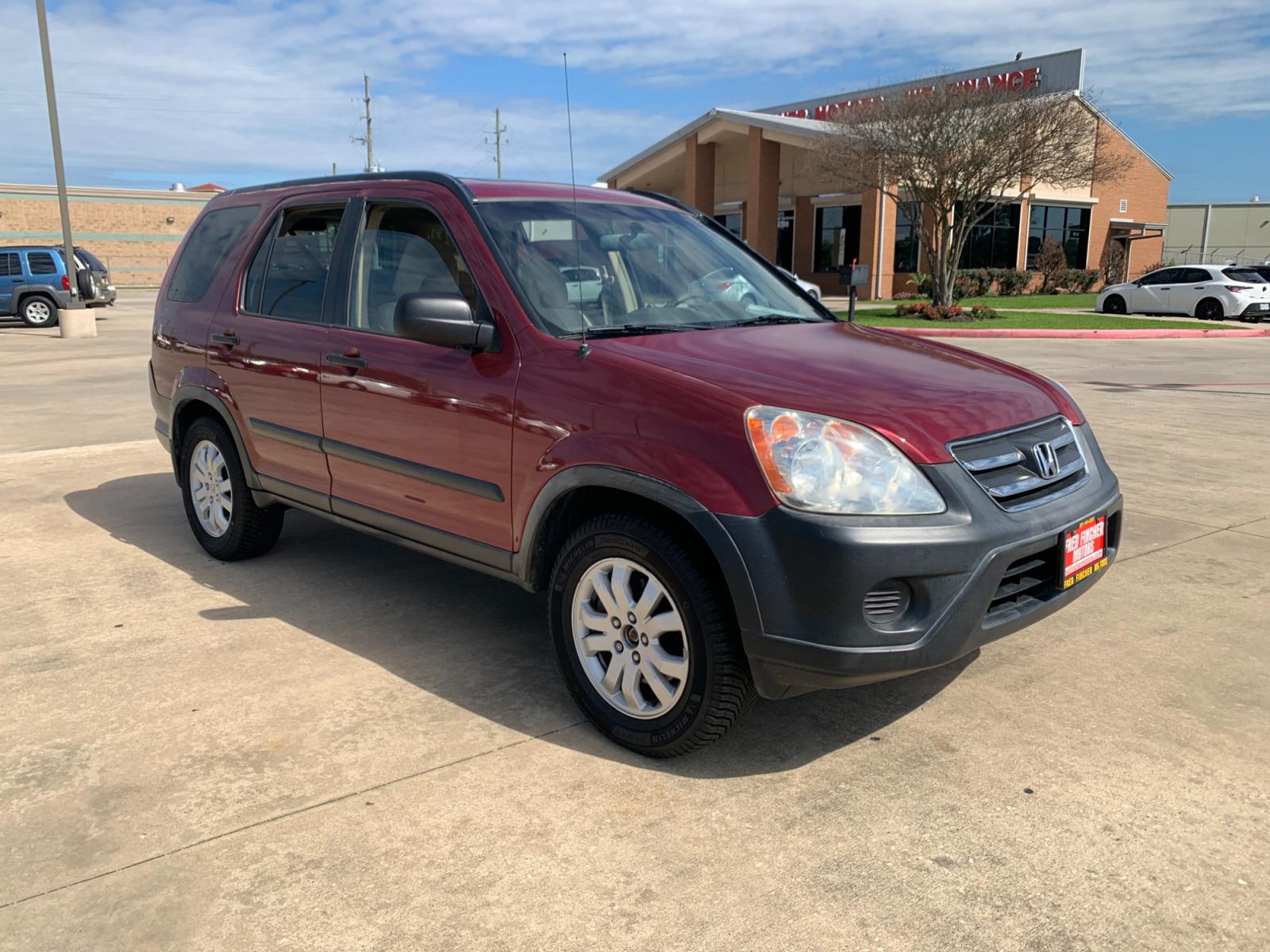 2005 red Honda CR-V EX 4WD AT (JHLRD78855C) with an 2.4L L4 DOHC 16V engine, 5-Speed Automatic Overdrive transmission, located at 14700 Tomball Parkway 249, Houston, TX, 77086, (281) 444-2200, 29.928619, -95.504074 - Photo #0