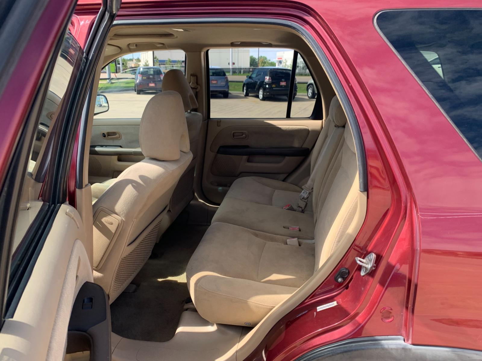2005 red Honda CR-V EX 4WD AT (JHLRD78855C) with an 2.4L L4 DOHC 16V engine, 5-Speed Automatic Overdrive transmission, located at 14700 Tomball Parkway 249, Houston, TX, 77086, (281) 444-2200, 29.928619, -95.504074 - Photo #9