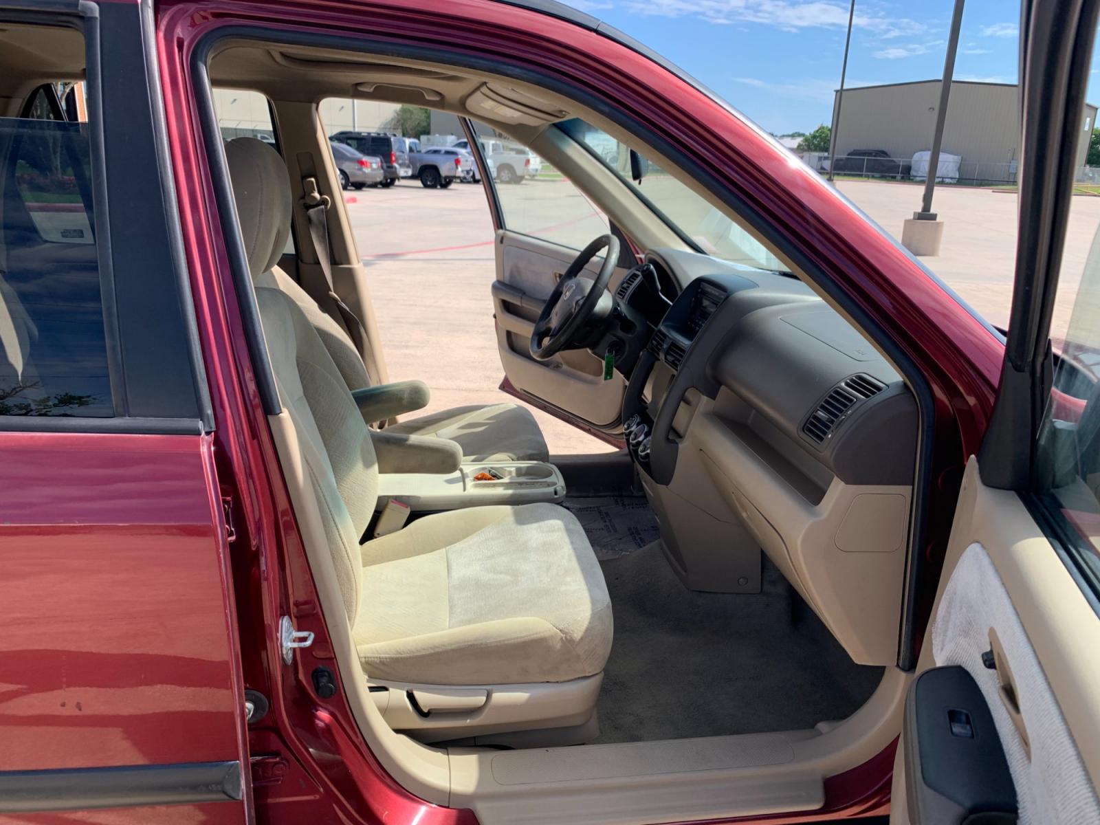 2005 red Honda CR-V EX 4WD AT (JHLRD78855C) with an 2.4L L4 DOHC 16V engine, 5-Speed Automatic Overdrive transmission, located at 14700 Tomball Parkway 249, Houston, TX, 77086, (281) 444-2200, 29.928619, -95.504074 - Photo #11
