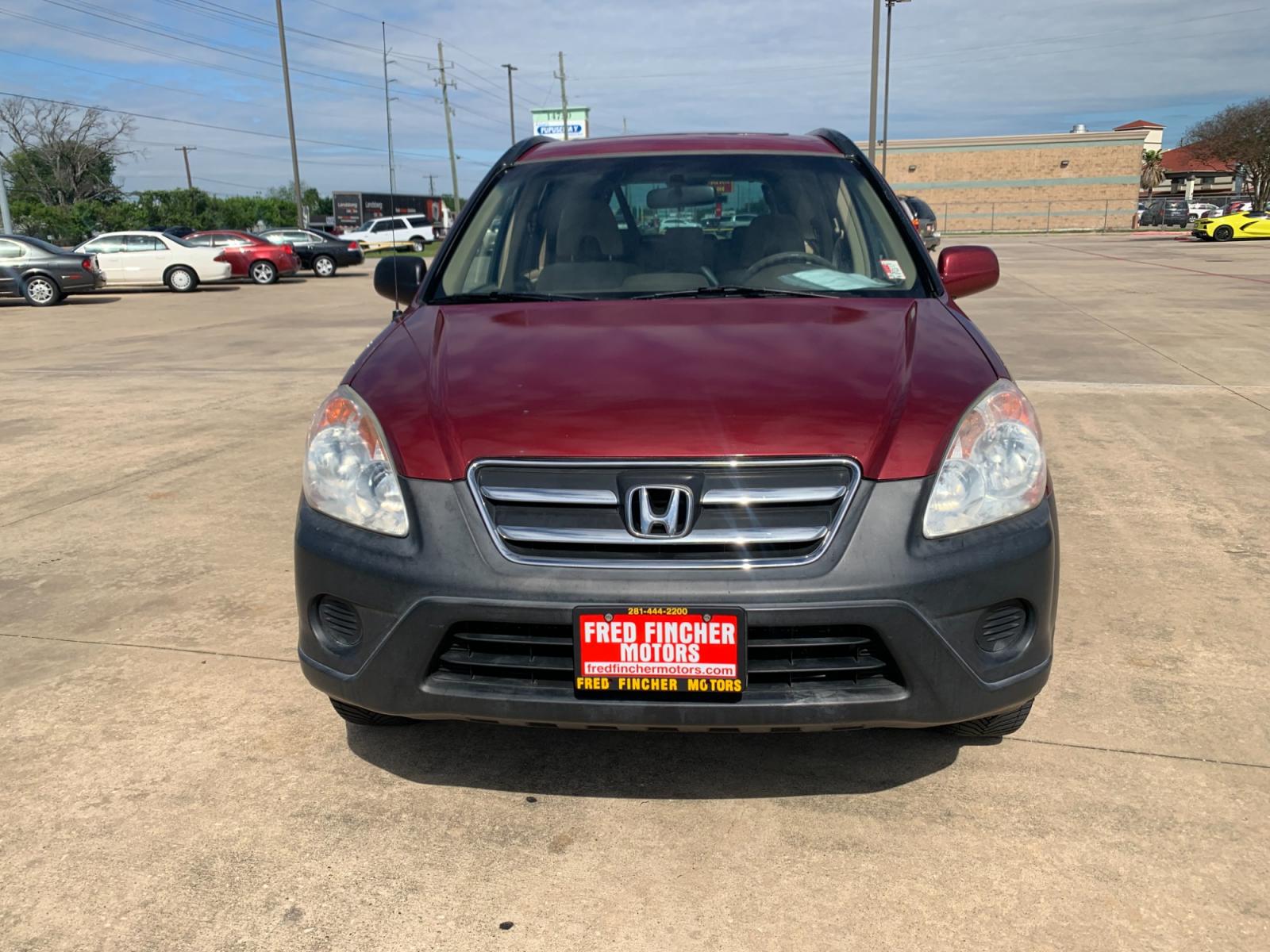 2005 red Honda CR-V EX 4WD AT (JHLRD78855C) with an 2.4L L4 DOHC 16V engine, 5-Speed Automatic Overdrive transmission, located at 14700 Tomball Parkway 249, Houston, TX, 77086, (281) 444-2200, 29.928619, -95.504074 - Photo #1