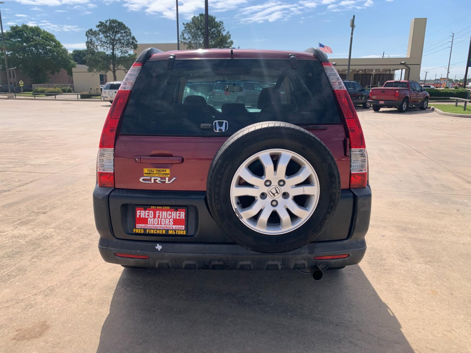 2005 red Honda CR-V EX 4WD AT (JHLRD78855C) with an 2.4L L4 DOHC 16V engine, 5-Speed Automatic Overdrive transmission, located at 14700 Tomball Parkway 249, Houston, TX, 77086, (281) 444-2200, 29.928619, -95.504074 - Photo #5