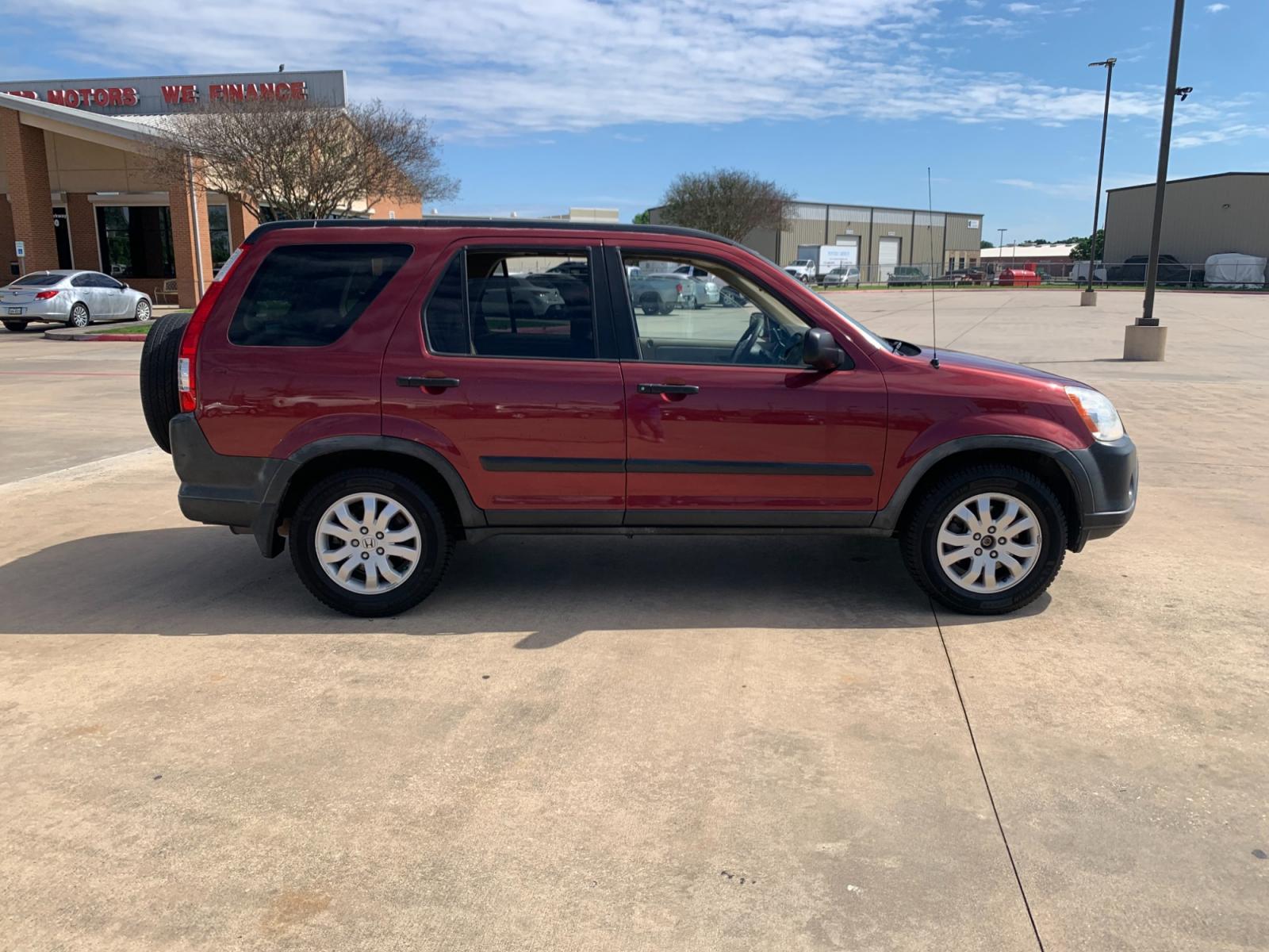 2005 red Honda CR-V EX 4WD AT (JHLRD78855C) with an 2.4L L4 DOHC 16V engine, 5-Speed Automatic Overdrive transmission, located at 14700 Tomball Parkway 249, Houston, TX, 77086, (281) 444-2200, 29.928619, -95.504074 - Photo #7