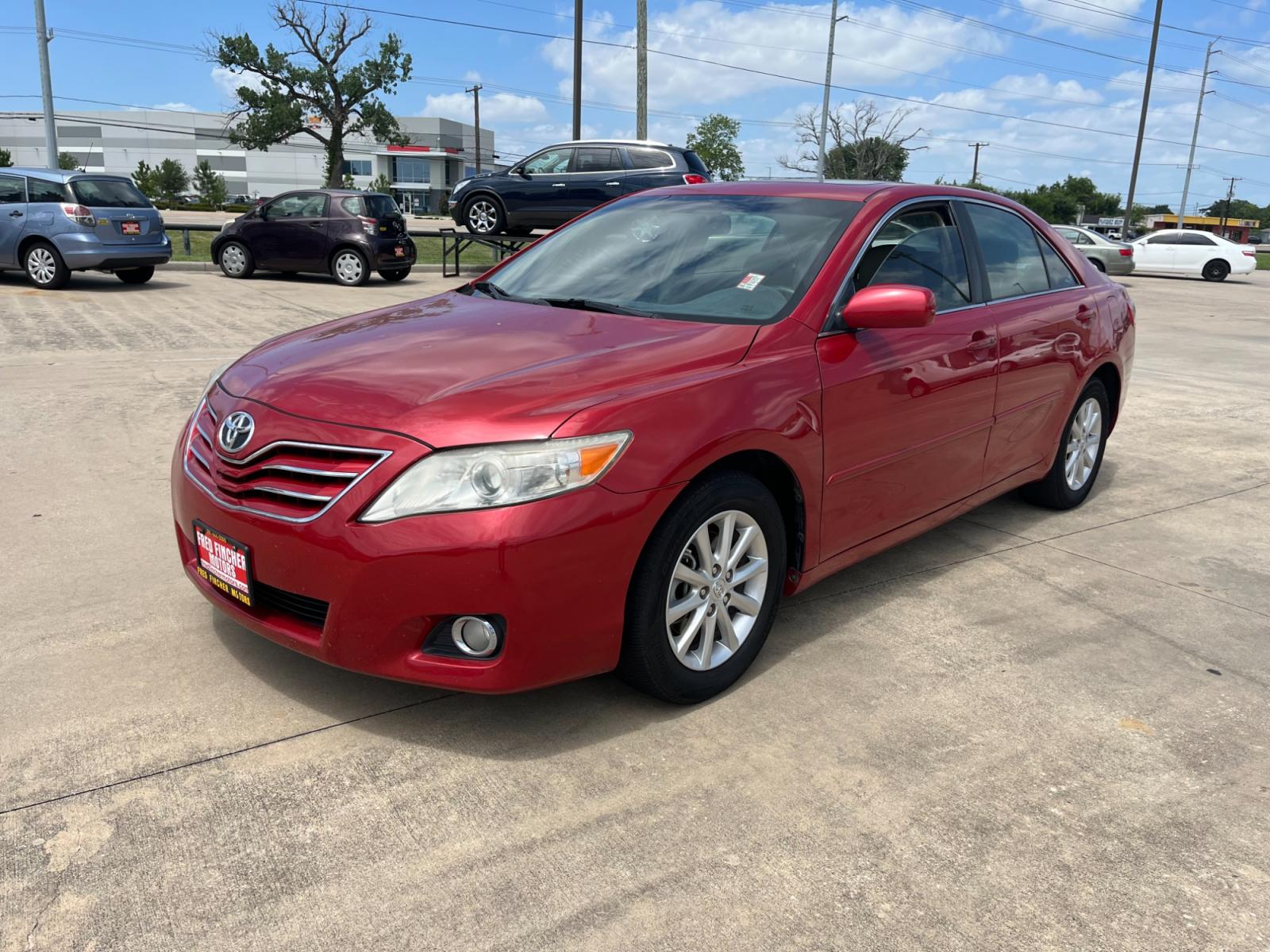 2010 red /TAN Toyota Camry LE V6 6-Spd AT (4T1BK3EK7AU) with an 3.5L V6 DOHC 24V engine, 6-Speed Automatic transmission, located at 14700 Tomball Parkway 249, Houston, TX, 77086, (281) 444-2200, 29.928619, -95.504074 - Photo #2