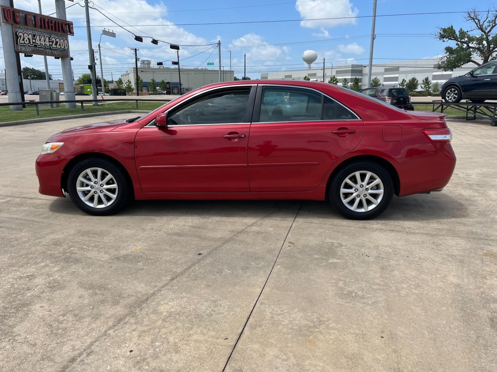 2010 red /TAN Toyota Camry LE V6 6-Spd AT (4T1BK3EK7AU) with an 3.5L V6 DOHC 24V engine, 6-Speed Automatic transmission, located at 14700 Tomball Parkway 249, Houston, TX, 77086, (281) 444-2200, 29.928619, -95.504074 - Photo #3
