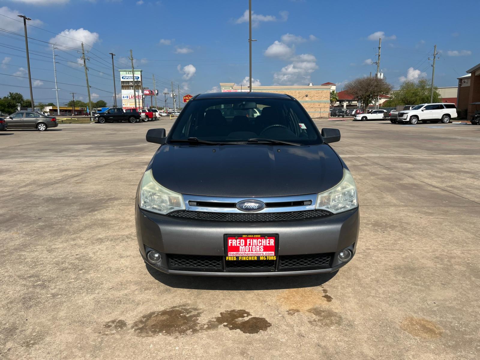 2010 /black Ford Focus SE Sedan (1FAHP3FN5AW) with an 2.0L L4 DOHC 16V engine, Automatic transmission, located at 14700 Tomball Parkway 249, Houston, TX, 77086, (281) 444-2200, 29.928619, -95.504074 - Photo #1