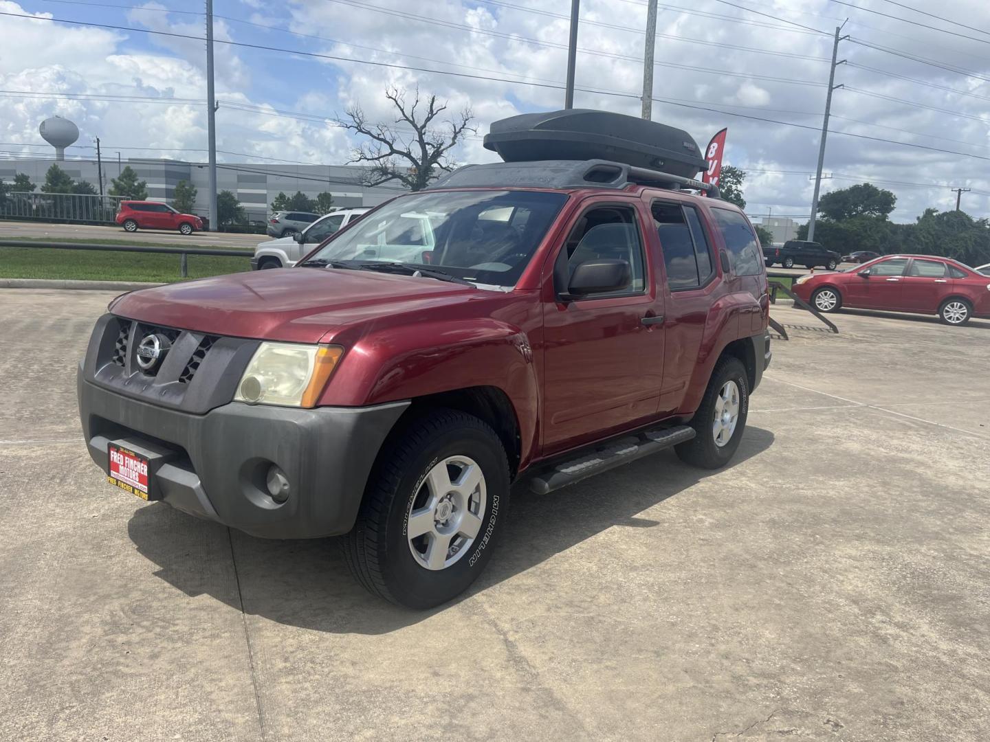 2007 red /black Nissan Xterra S 2WD (5N1AN08U07C) with an 4.0L V6 DOHC 24V engine, Automatic transmission, located at 14700 Tomball Parkway 249, Houston, TX, 77086, (281) 444-2200, 29.928619, -95.504074 - Photo#2