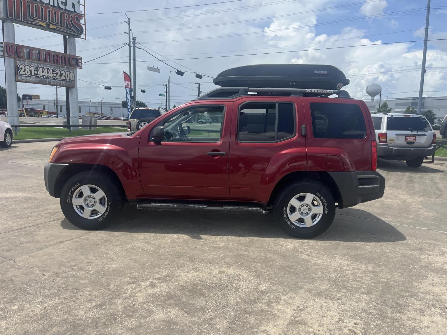 2007 red /black Nissan Xterra S 2WD (5N1AN08U07C) with an 4.0L V6 DOHC 24V engine, Automatic transmission, located at 14700 Tomball Parkway 249, Houston, TX, 77086, (281) 444-2200, 29.928619, -95.504074 - Photo#3