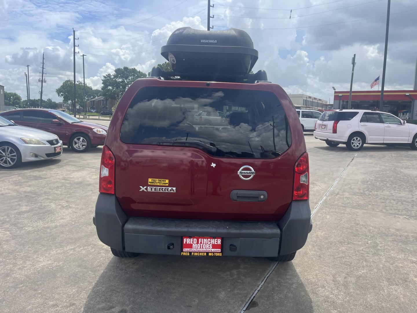 2007 red /black Nissan Xterra S 2WD (5N1AN08U07C) with an 4.0L V6 DOHC 24V engine, Automatic transmission, located at 14700 Tomball Parkway 249, Houston, TX, 77086, (281) 444-2200, 29.928619, -95.504074 - Photo#5