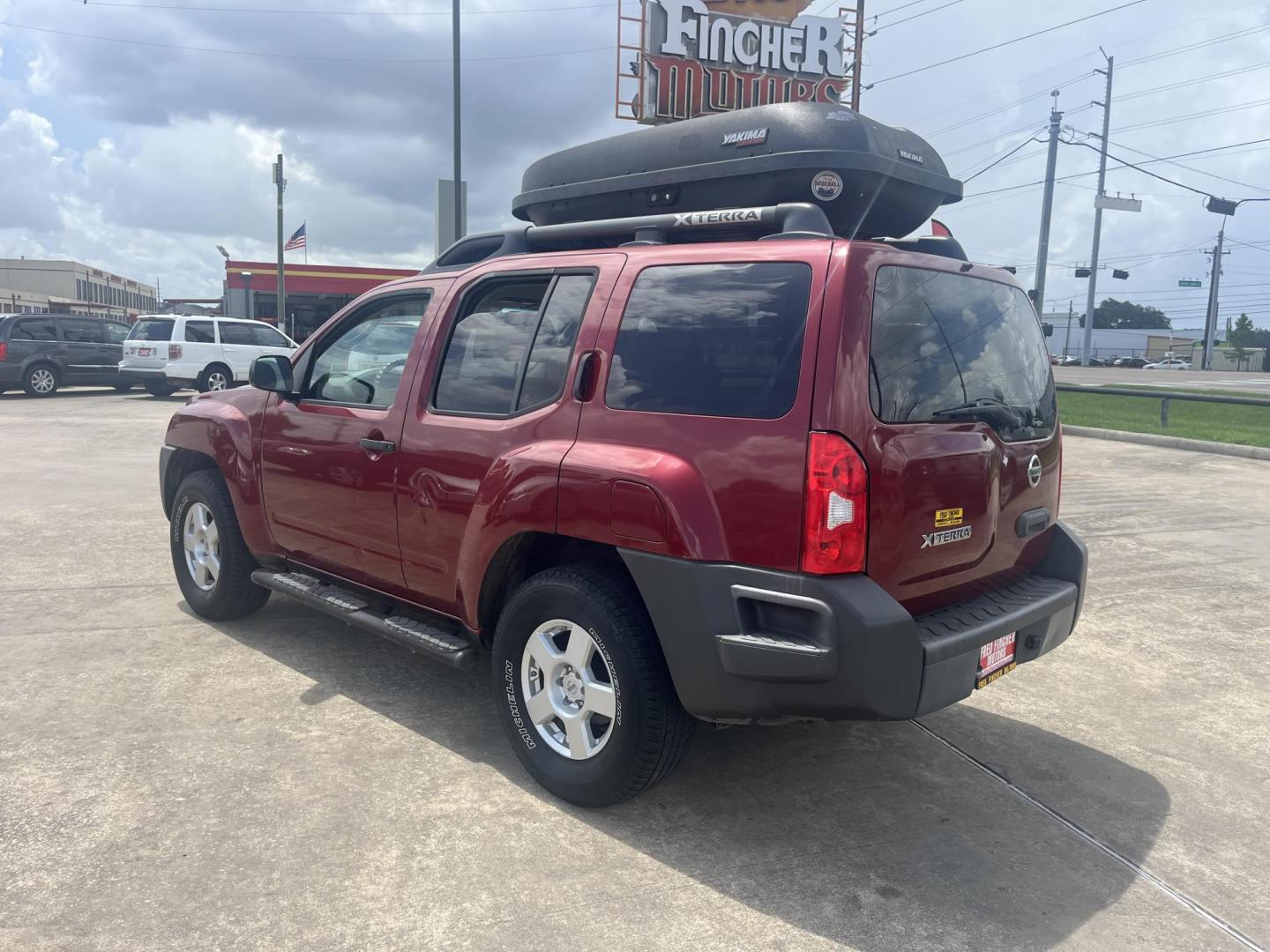 2007 red /black Nissan Xterra S 2WD (5N1AN08U07C) with an 4.0L V6 DOHC 24V engine, Automatic transmission, located at 14700 Tomball Parkway 249, Houston, TX, 77086, (281) 444-2200, 29.928619, -95.504074 - Photo#4