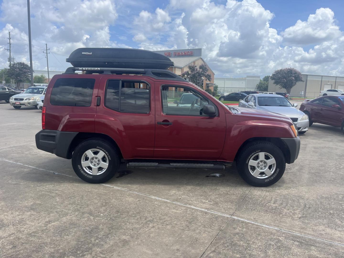 2007 red /black Nissan Xterra S 2WD (5N1AN08U07C) with an 4.0L V6 DOHC 24V engine, Automatic transmission, located at 14700 Tomball Parkway 249, Houston, TX, 77086, (281) 444-2200, 29.928619, -95.504074 - Photo#7