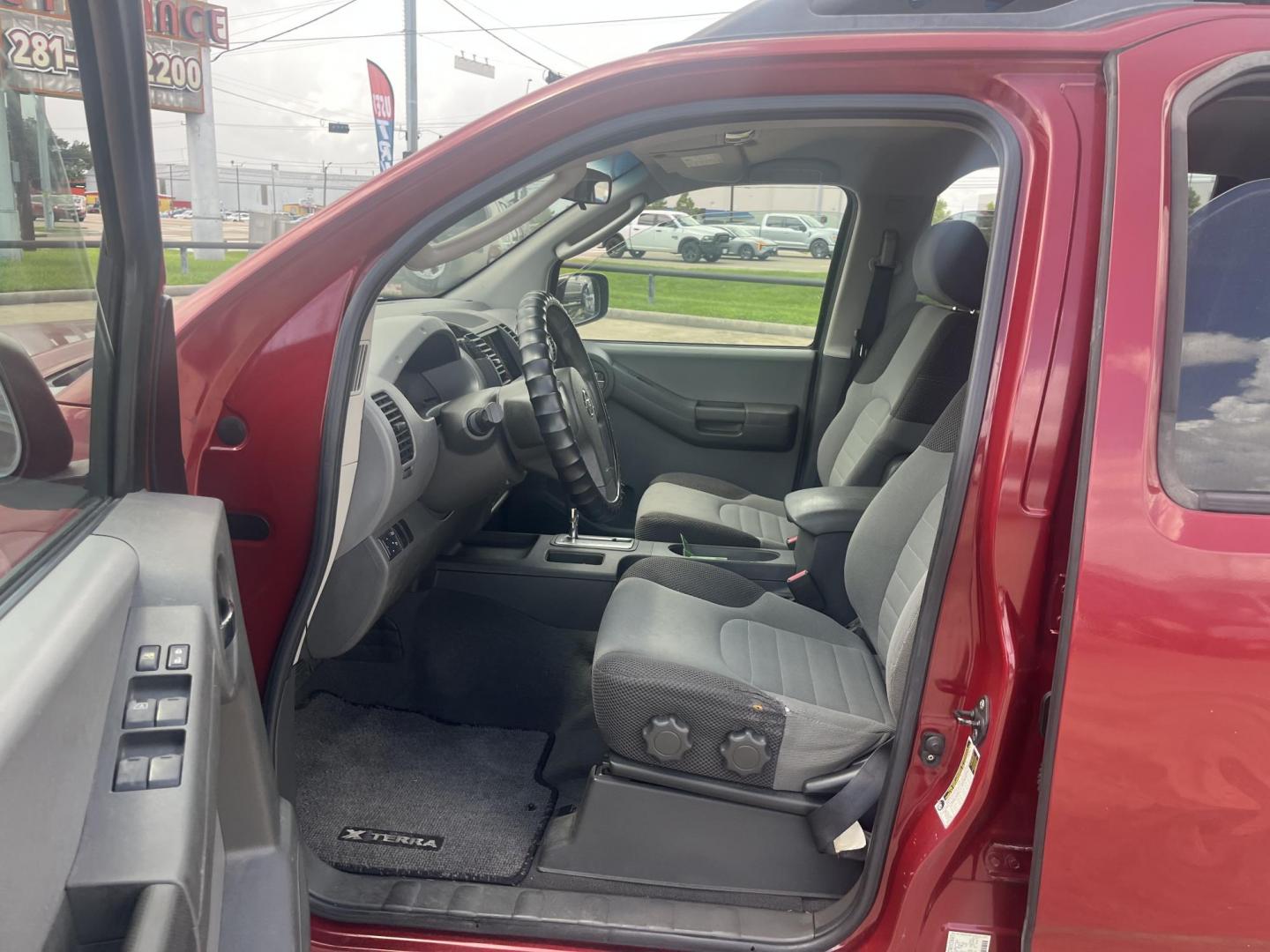 2007 red /black Nissan Xterra S 2WD (5N1AN08U07C) with an 4.0L V6 DOHC 24V engine, Automatic transmission, located at 14700 Tomball Parkway 249, Houston, TX, 77086, (281) 444-2200, 29.928619, -95.504074 - Photo#8