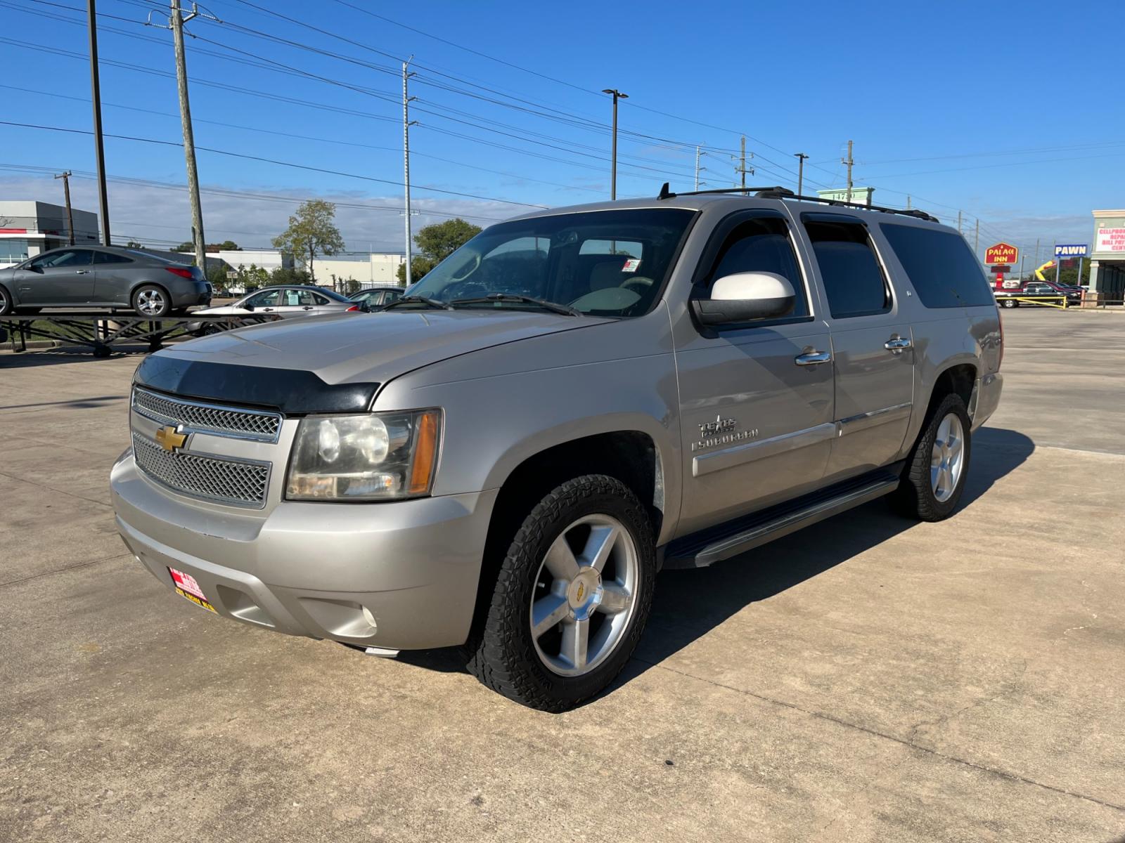 2007 SILVER /gray Chevrolet Suburban LS 1500 2WD (3GNFC16007G) with an 5.3L V8 OHV 16V FFV engine, 4-Speed Automatic Overdrive transmission, located at 14700 Tomball Parkway 249, Houston, TX, 77086, (281) 444-2200, 29.928619, -95.504074 - Photo #2