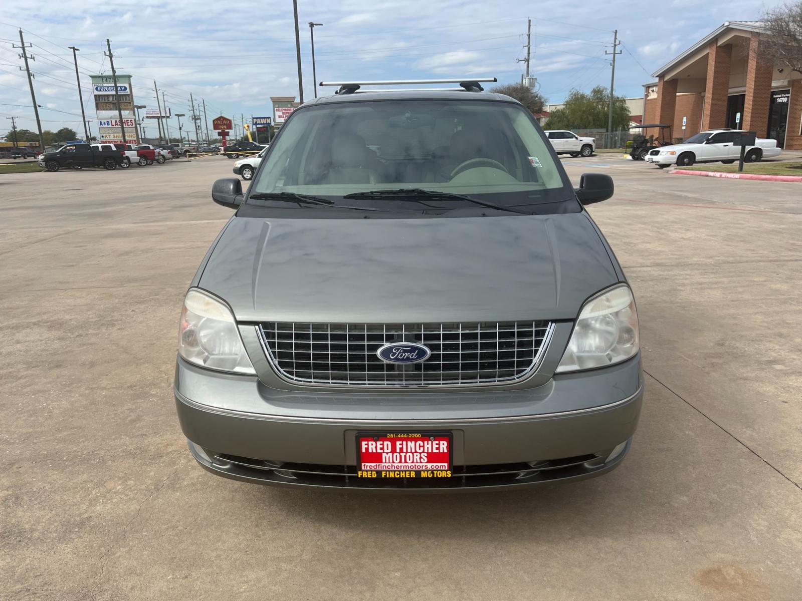 2004 green /TAN Ford Freestar SEL (2FMZA52264B) with an 4.2L V6 OHV 12V engine, 4-Speed Automatic Overdrive transmission, located at 14700 Tomball Parkway 249, Houston, TX, 77086, (281) 444-2200, 29.928619, -95.504074 - Photo #1