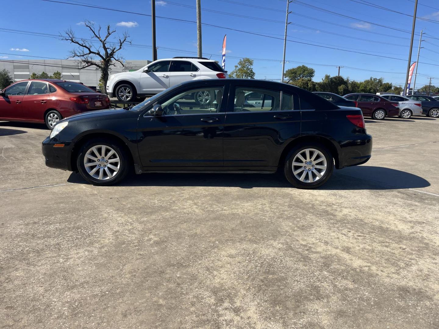 2010 Black /TAN Chrysler Sebring Sedan Limited (1C3CC5FB2AN) with an 2.4L L4 DOHC 16V engine, 4-Speed Automatic transmission, located at 14700 Tomball Parkway 249, Houston, TX, 77086, (281) 444-2200, 29.928619, -95.504074 - Photo#3