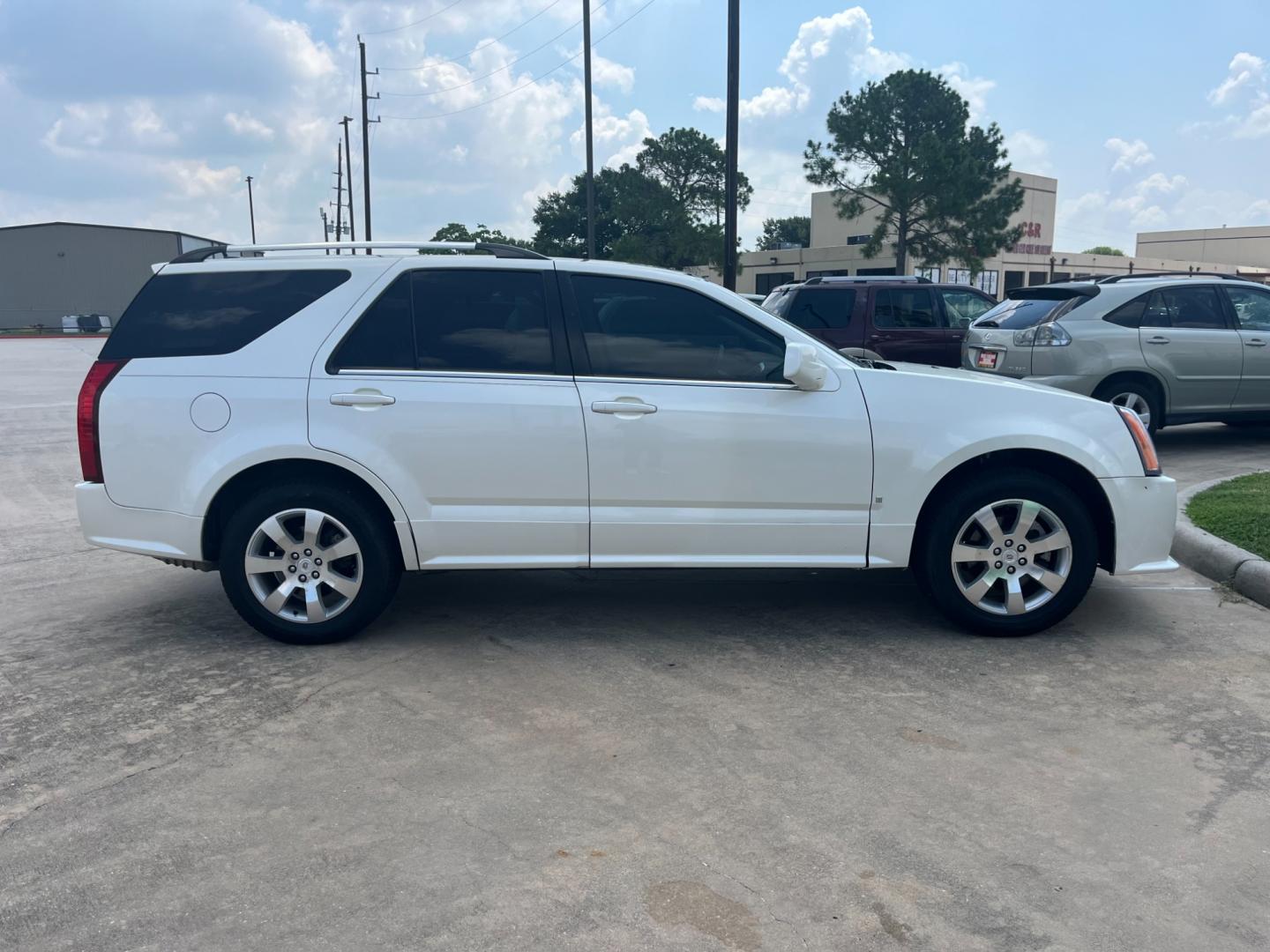 2008 white /TAN Cadillac SRX V6 (1GYEE637980) with an 3.6L V6 OHV 24V engine, 5-Speed Automatic Overdrive transmission, located at 14700 Tomball Parkway 249, Houston, TX, 77086, (281) 444-2200, 29.928619, -95.504074 - Photo#7