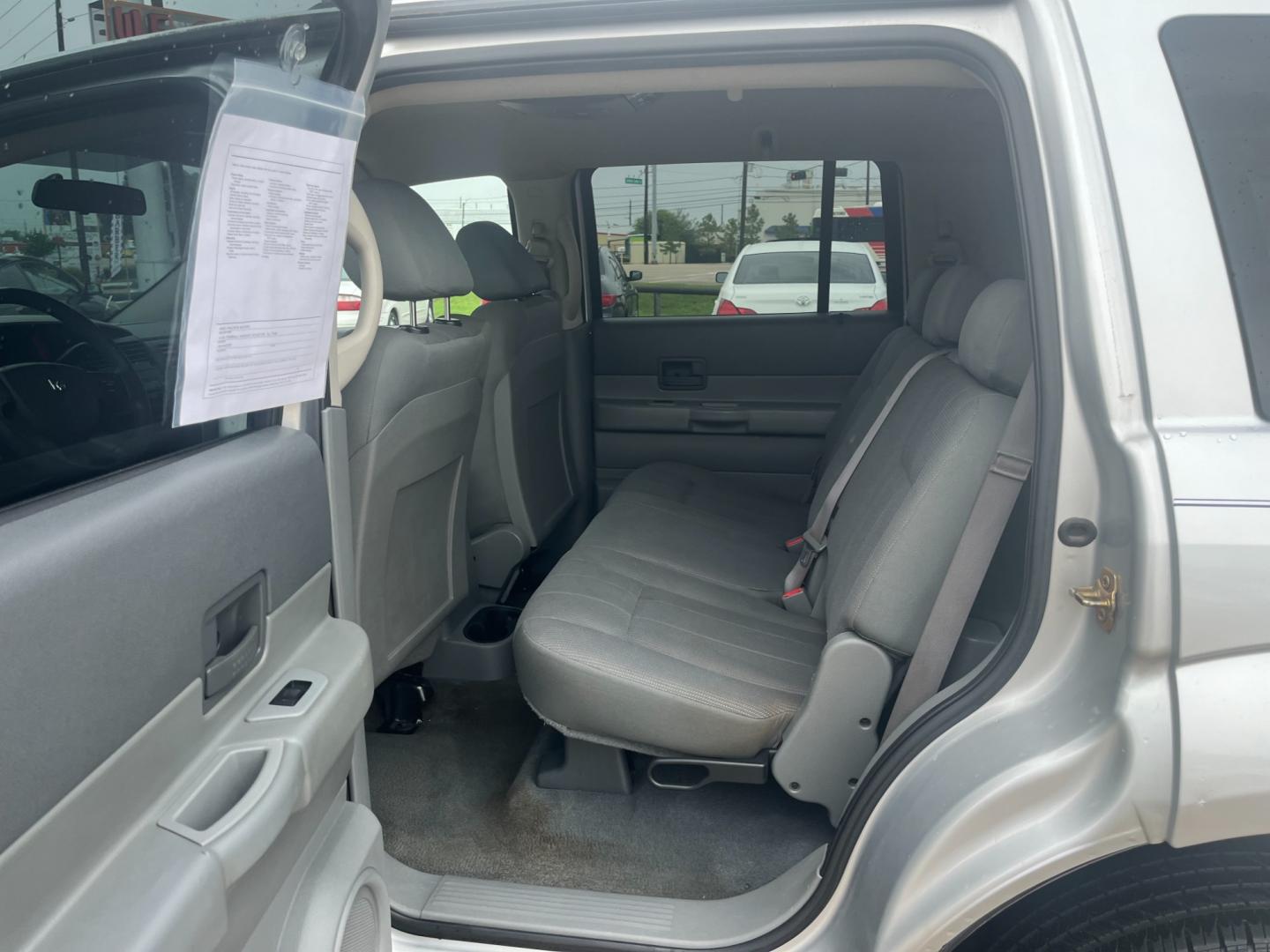 2004 silver /gray Dodge Durango ST 2WD (1D4HD38N64F) with an 4.7L V8 SOHC 16V engine, Automatic transmission, located at 14700 Tomball Parkway 249, Houston, TX, 77086, (281) 444-2200, 29.928619, -95.504074 - Photo#9