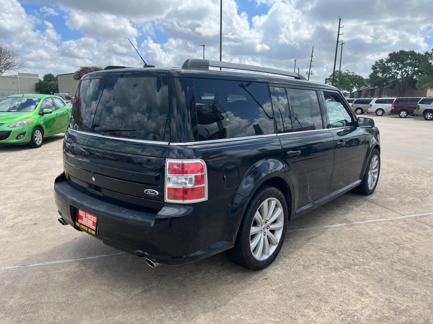 2013 Black /TAN Ford Flex (2FMGK5C87DB) , Automatic transmission, located at 14700 Tomball Parkway 249, Houston, TX, 77086, (281) 444-2200, 29.928619, -95.504074 - Photo#6