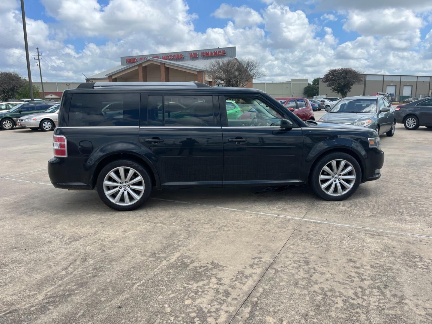 2013 Black /TAN Ford Flex (2FMGK5C87DB) , Automatic transmission, located at 14700 Tomball Parkway 249, Houston, TX, 77086, (281) 444-2200, 29.928619, -95.504074 - Photo#7