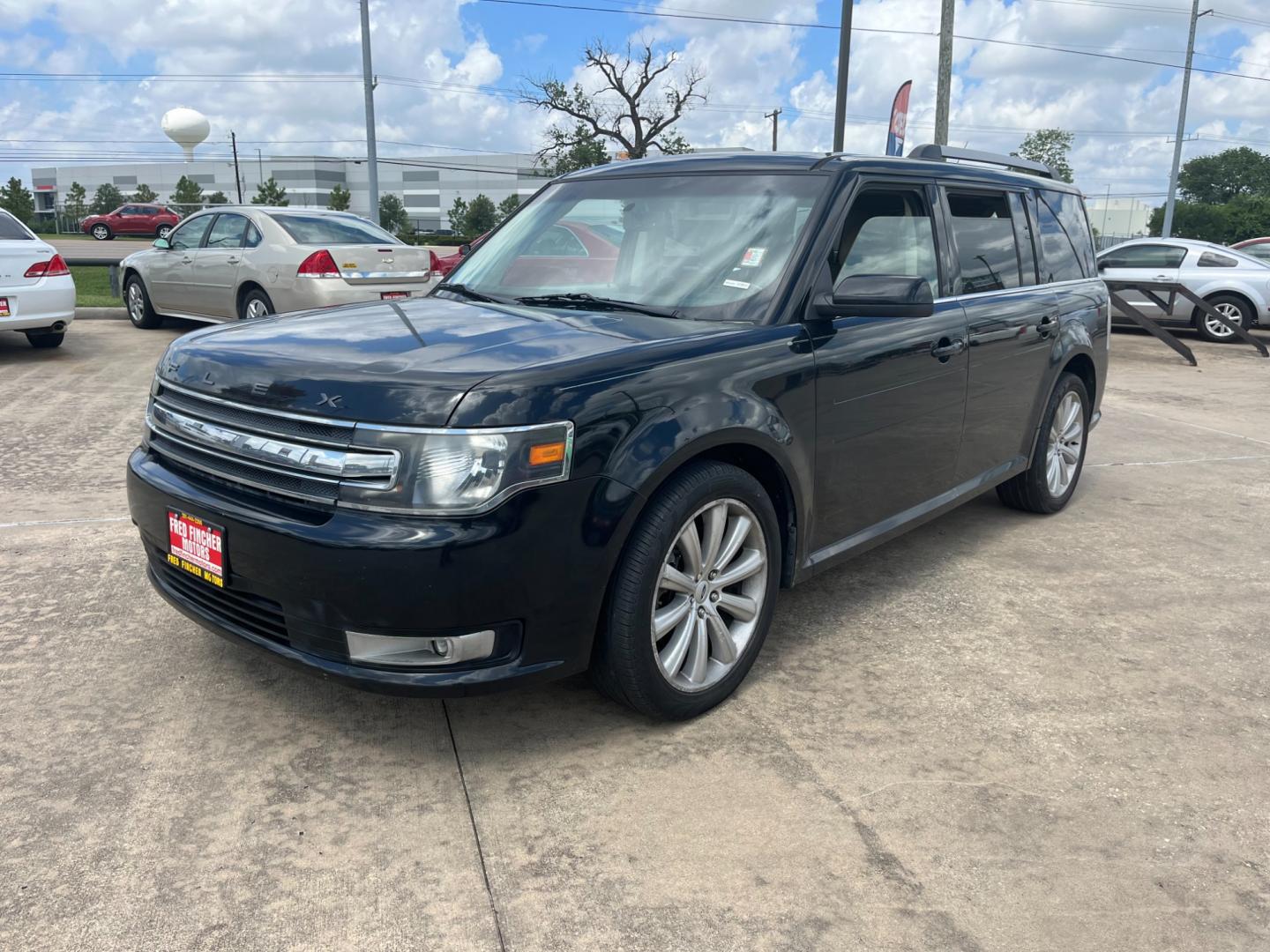 2013 Black /TAN Ford Flex (2FMGK5C87DB) , Automatic transmission, located at 14700 Tomball Parkway 249, Houston, TX, 77086, (281) 444-2200, 29.928619, -95.504074 - Photo#2