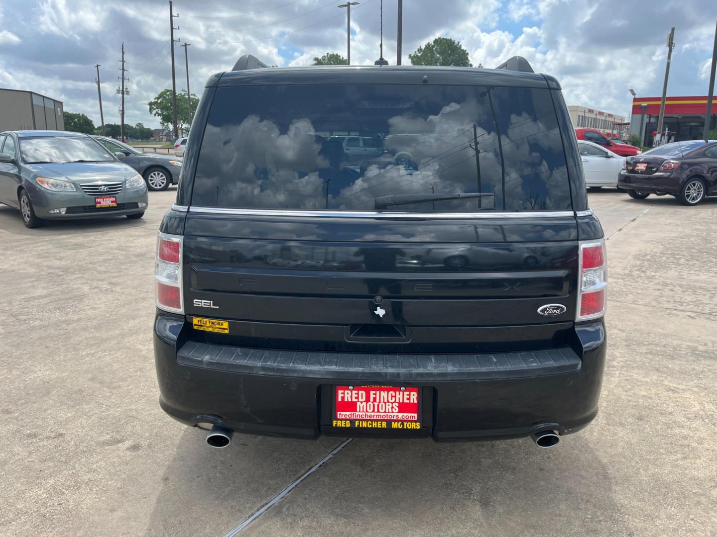 2013 Black /TAN Ford Flex (2FMGK5C87DB) , Automatic transmission, located at 14700 Tomball Parkway 249, Houston, TX, 77086, (281) 444-2200, 29.928619, -95.504074 - Photo#5