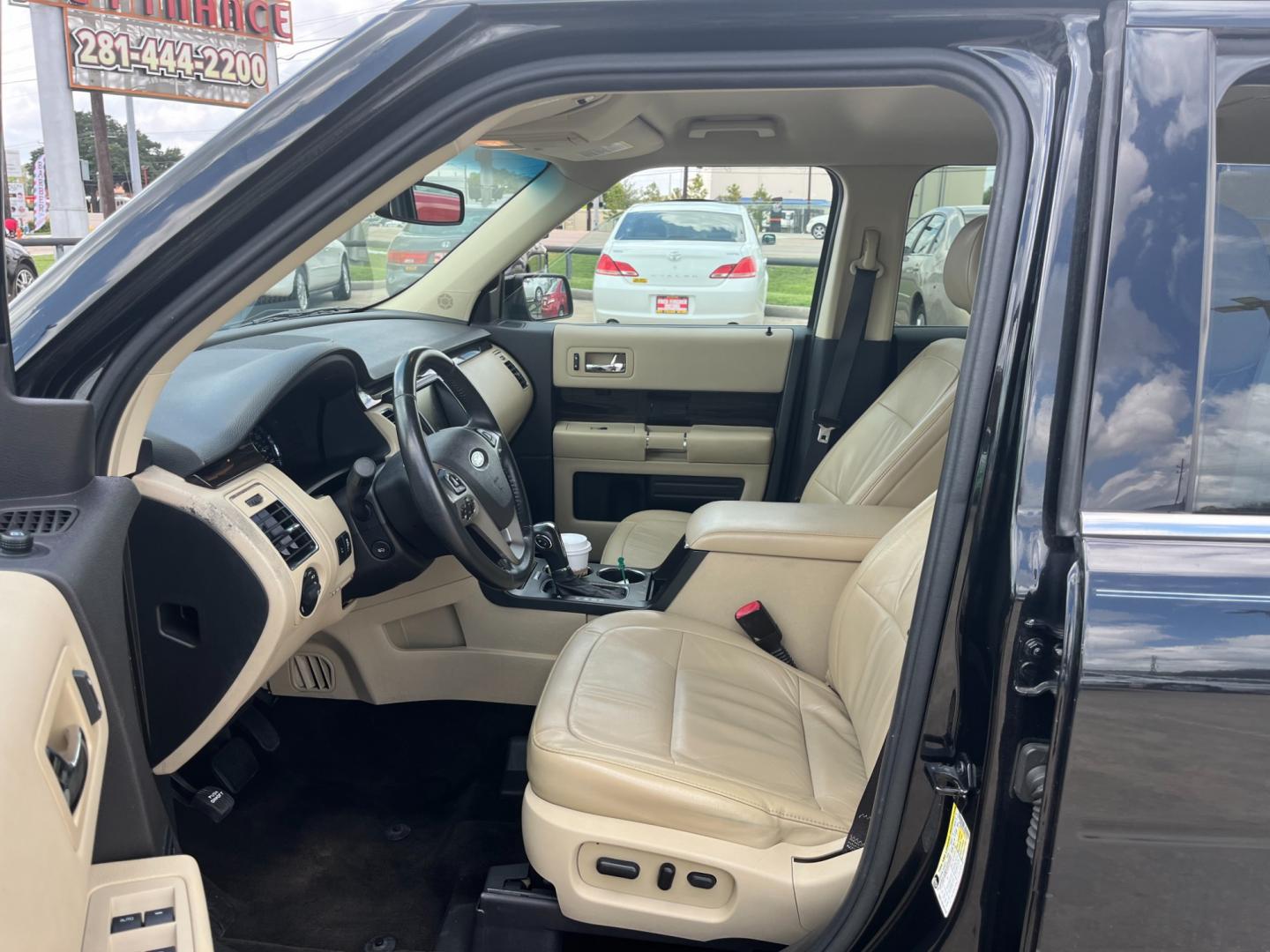 2013 Black /TAN Ford Flex (2FMGK5C87DB) , Automatic transmission, located at 14700 Tomball Parkway 249, Houston, TX, 77086, (281) 444-2200, 29.928619, -95.504074 - Photo#8
