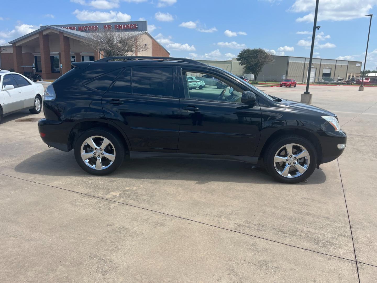 2007 Black /black Lexus RX 350 FWD (2T2GK31U07C) with an 3.5L V6 DOHC 24V engine, 5-Speed Automatic Overdrive transmission, located at 14700 Tomball Parkway 249, Houston, TX, 77086, (281) 444-2200, 29.928619, -95.504074 - Photo#7