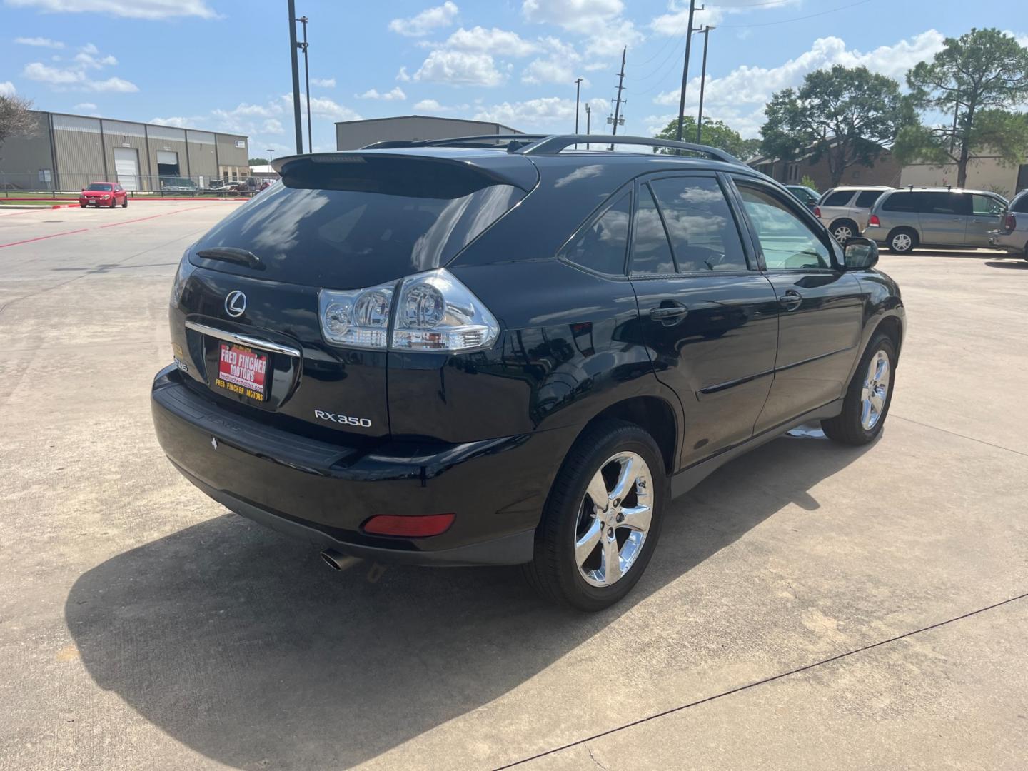 2007 Black /black Lexus RX 350 FWD (2T2GK31U07C) with an 3.5L V6 DOHC 24V engine, 5-Speed Automatic Overdrive transmission, located at 14700 Tomball Parkway 249, Houston, TX, 77086, (281) 444-2200, 29.928619, -95.504074 - Photo#6