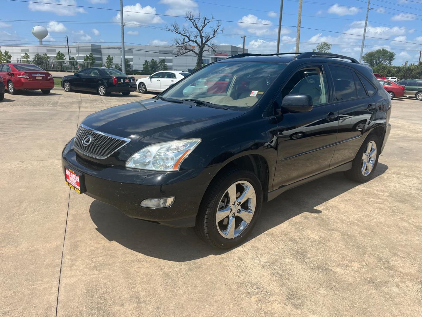 2007 Black /black Lexus RX 350 FWD (2T2GK31U07C) with an 3.5L V6 DOHC 24V engine, 5-Speed Automatic Overdrive transmission, located at 14700 Tomball Parkway 249, Houston, TX, 77086, (281) 444-2200, 29.928619, -95.504074 - Photo#2