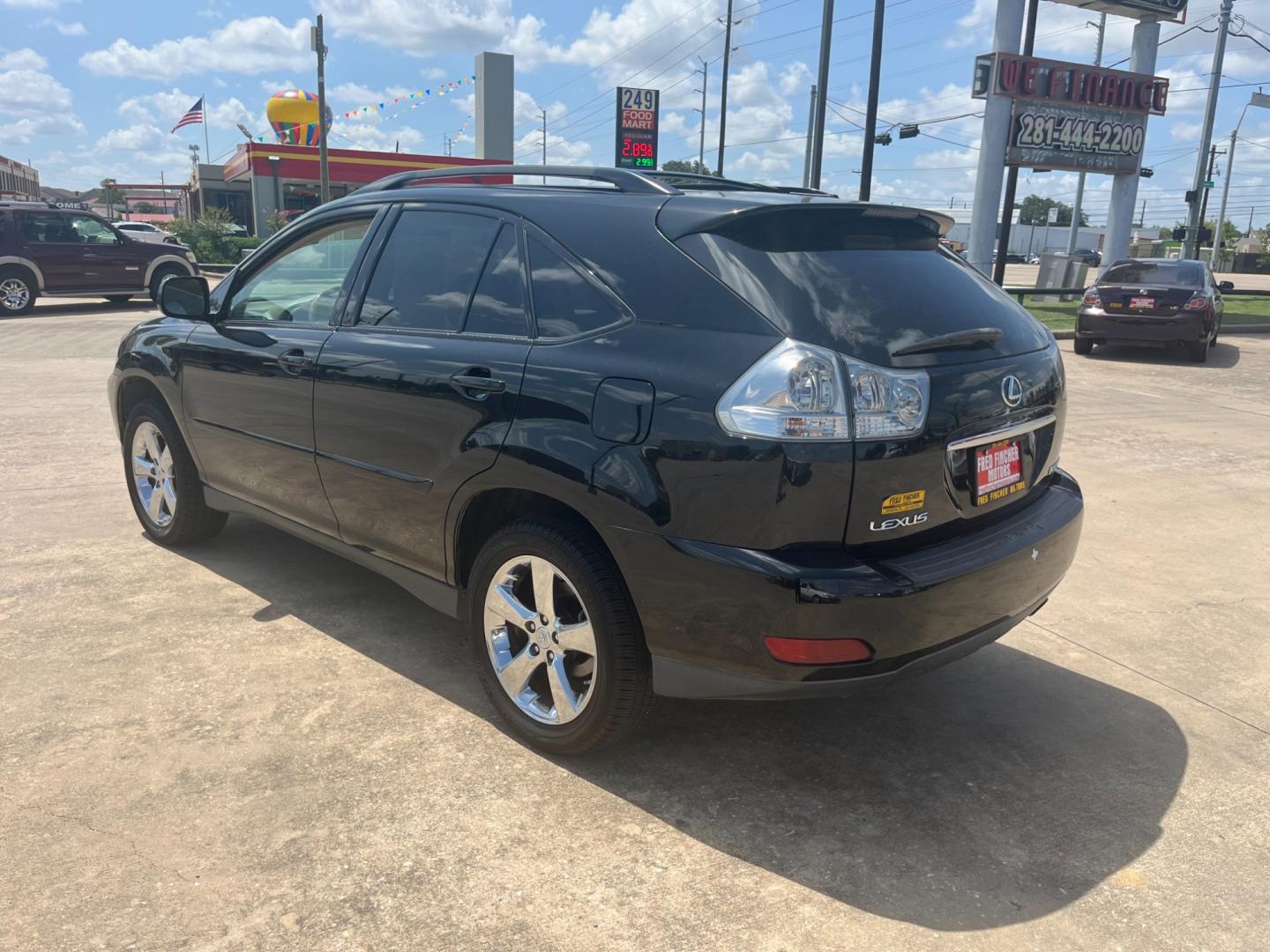 2007 Black /black Lexus RX 350 FWD (2T2GK31U07C) with an 3.5L V6 DOHC 24V engine, 5-Speed Automatic Overdrive transmission, located at 14700 Tomball Parkway 249, Houston, TX, 77086, (281) 444-2200, 29.928619, -95.504074 - Photo#4