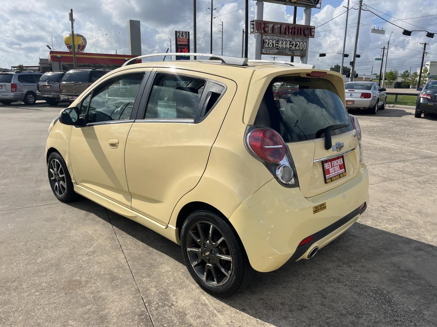 2014 /black Chevrolet Spark 2LT Auto (KL8CF6S92EC) with an 1.2L L4 16V DOHC engine, Continuously Variable Transmission transmission, located at 14700 Tomball Parkway 249, Houston, TX, 77086, (281) 444-2200, 29.928619, -95.504074 - Photo#4